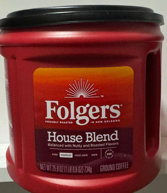 Folgers House Blend ground coffee in glossy red canister with black lid, medium roast flavor profile highlighted on label