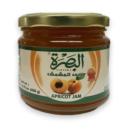 Basra Whole Apricot Jam 400g glass jar with gold lid and Arabic label showing golden-brown fruit preserves