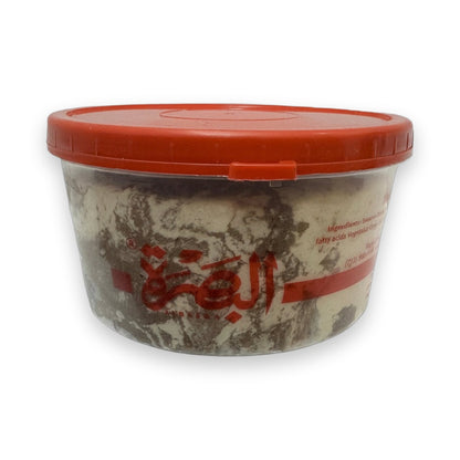 Al Basra Halawa Coco 1LB in clear plastic with red lid showing marbled coconut and tahini swirls