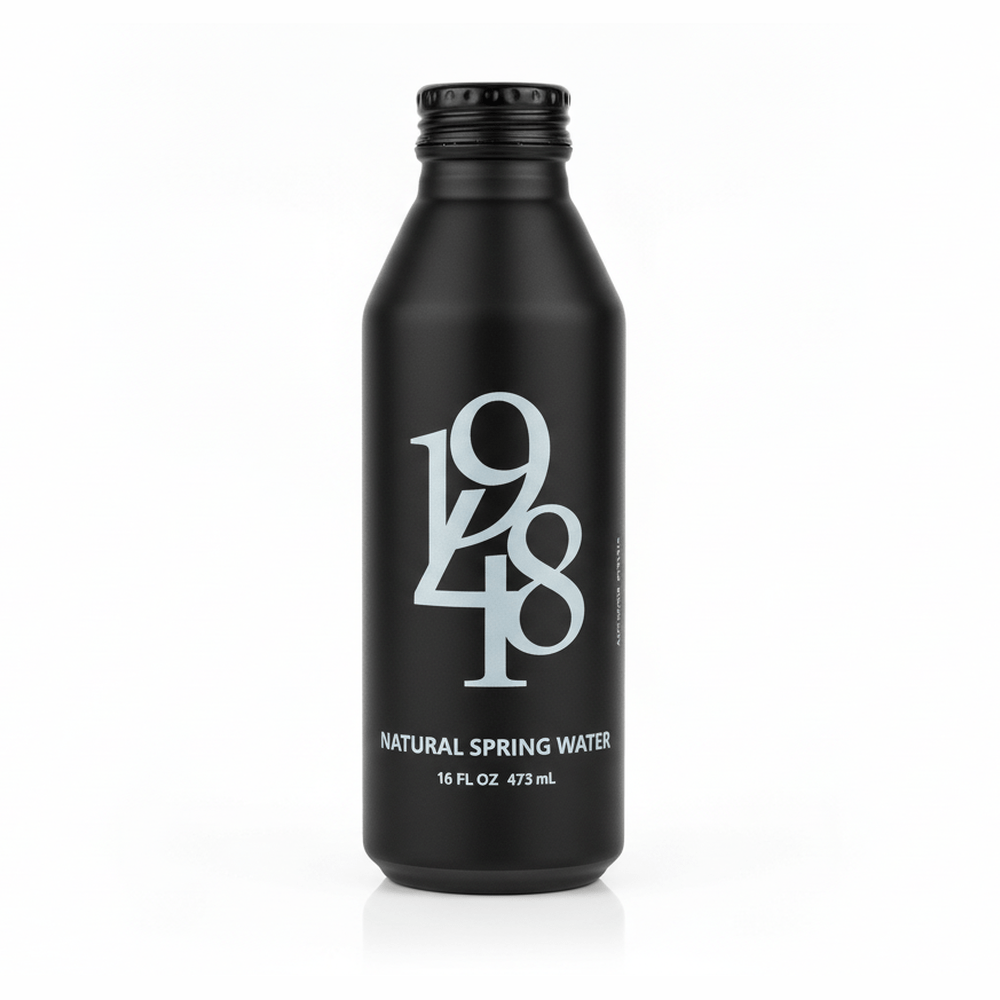 Front view of 1948 Water Black Edition tapered matte black spring water bottle