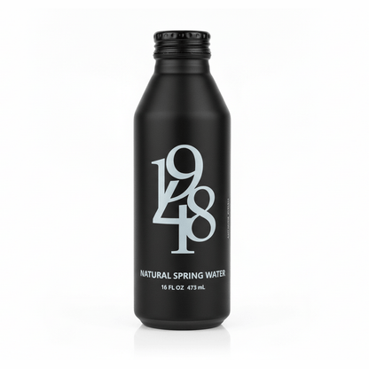 Front view of 1948 Water Black Edition tapered matte black spring water bottle