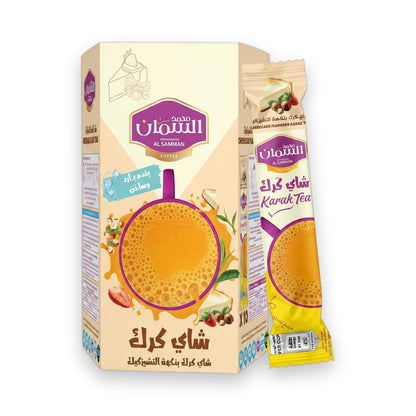 Al Samman Karak Tea Cheesecake Flavor 10pk beige box with yellow-purple sleeve, strawberry and hazelnut illustrations