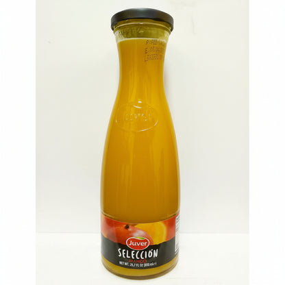 Juver Mango 850ml glass bottle with black cap and red label showing golden-orange juice