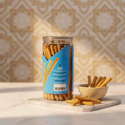 Qabalan salted herb labneh sticks in glass jar on marble with ceramic bowl
