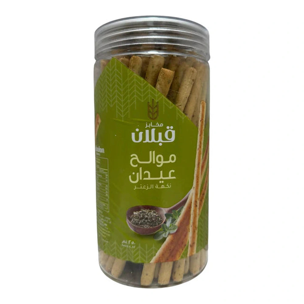 Side view of Qabalan Salt Sticks Thyme 250g highlighting granular texture and mint leaf illustration