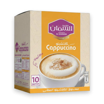 Al Samman Cappuccino 10pk box with mustard-yellow band, purple logo, and frothy coffee mug on white background